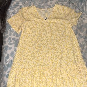 cute thin sundress. yellow with flower design